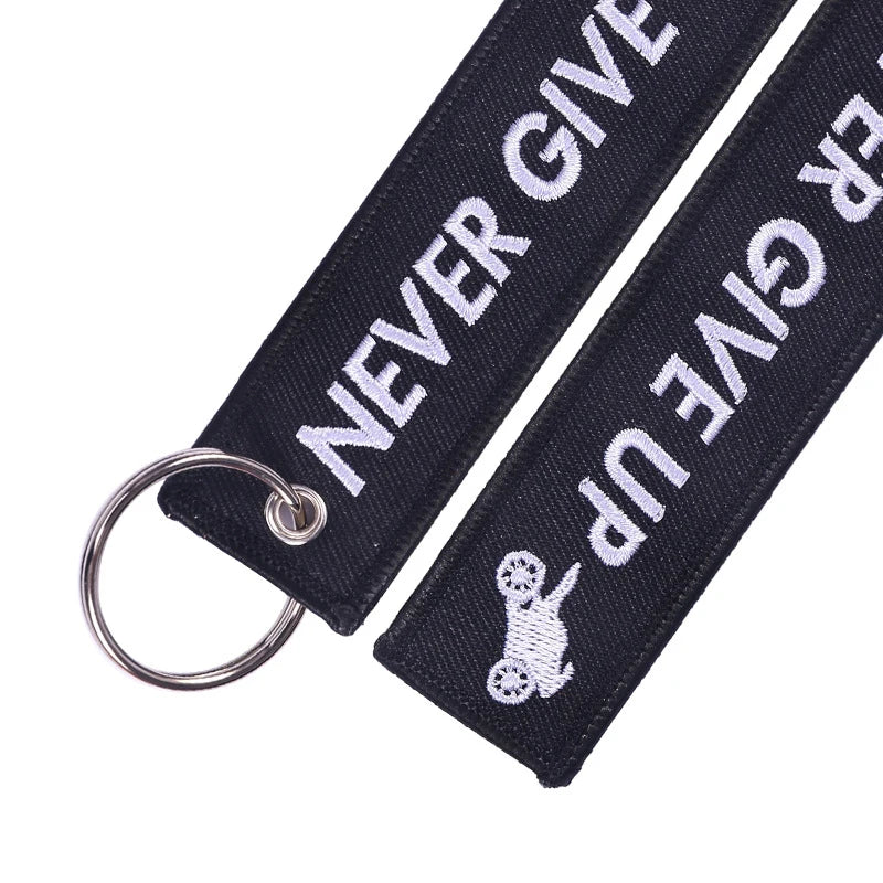 Fashion Embroidery Car Keychains Never Give UP Double Side Tag Novelty Keychain for Motorcycle Keys Keyring Men Boyfriend Gift