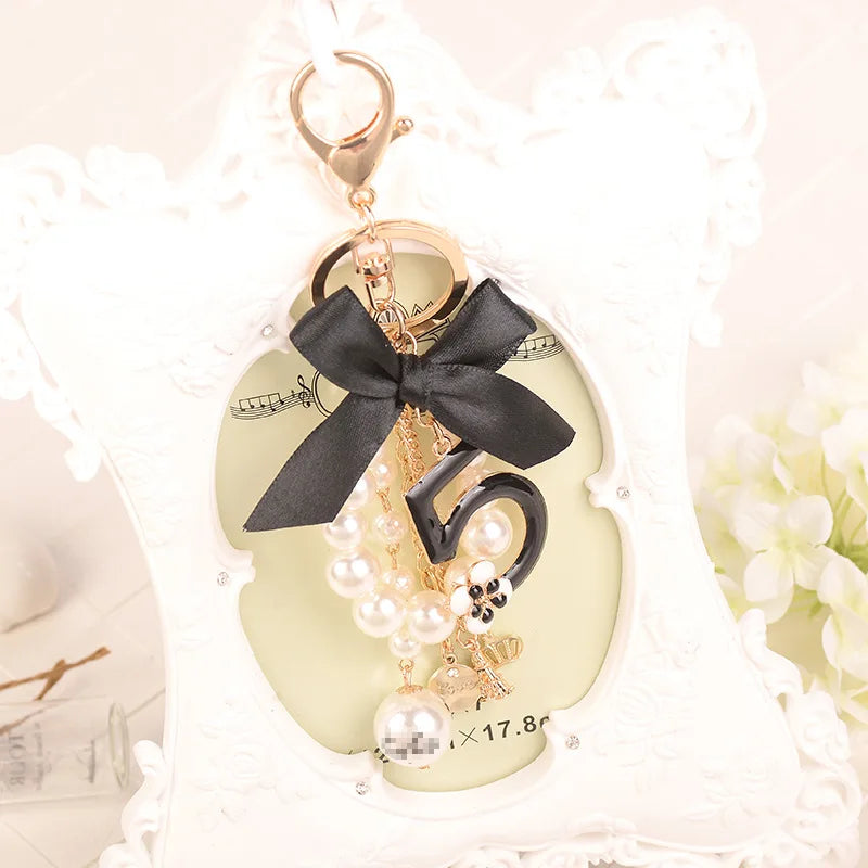 Number 5 Camellia Bag Pendant For Woman Luxury Jewelry Bow Car Keyring Bowknot Camellia Pearl Keychains Bag Decoration