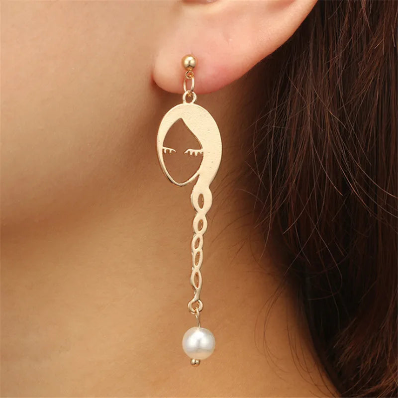 Face earrings Geometric fashion pearl female Fashion women Metal hollow out stud earrings