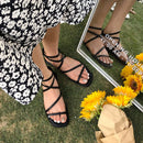 SUOJIALUN New Fashion Women Sandals Flat Heel Narrow Band Back Strap Summer Gladiator Shoes Ladies Casual Summer Beach Slides
