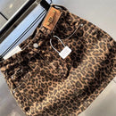 New short skirt 2025 summer American fashion elastic coffee leopard print denim hip skirt hot girl patch small short skirt