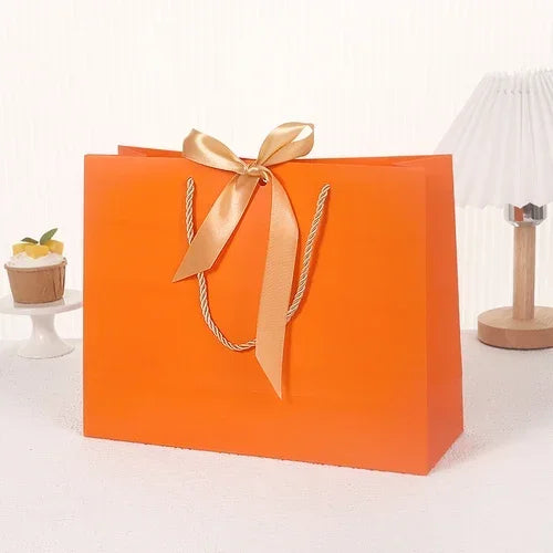 10pcs/lot High Quality Pretty Pink Gift Bag Gift Box Ornament Pajama Book Black Handle With Ribbon Paper Box Bag Kraft Packaging