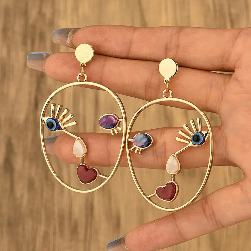 Creative Abstract Face Pendant Earrings For Women Gold-color Hollow Geometric Evil Eye Beads Dangle Earrings Female Jewelry