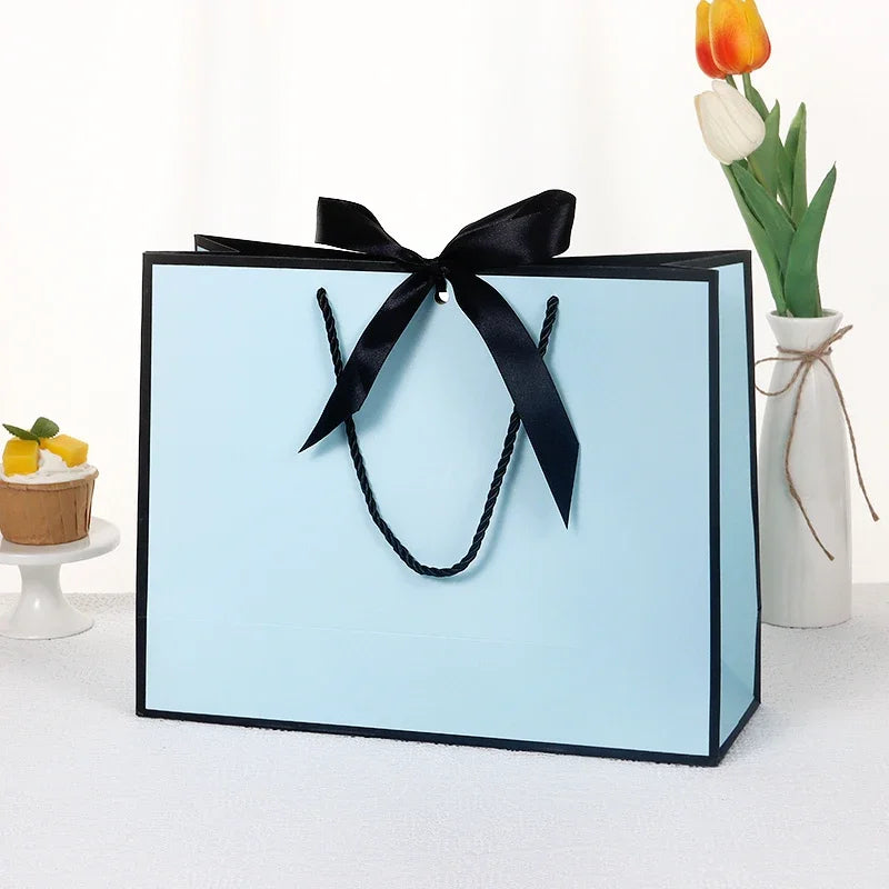 10pcs/lot High Quality Pretty Pink Gift Bag Gift Box Ornament Pajama Book Black Handle With Ribbon Paper Box Bag Kraft Packaging