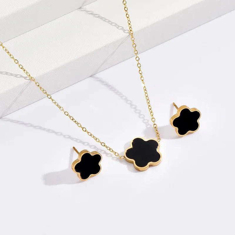 Light luxury high-end plum blossom five leaf lucky grass flower titanium steel necklace earrings, women's five leaf flower set a