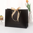 10pcs/lot High Quality Pretty Pink Gift Bag Gift Box Ornament Pajama Book Black Handle With Ribbon Paper Box Bag Kraft Packaging