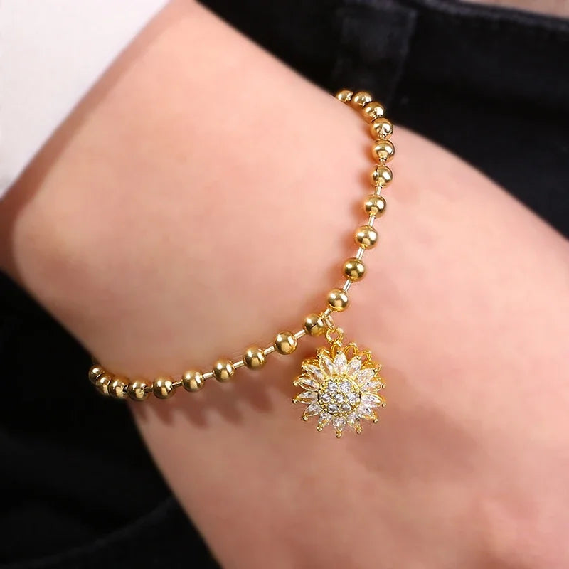 Fashionable 360° rotating sunflower zircon ball titanium steel bracelet for ladies birthday gift Christmas gift