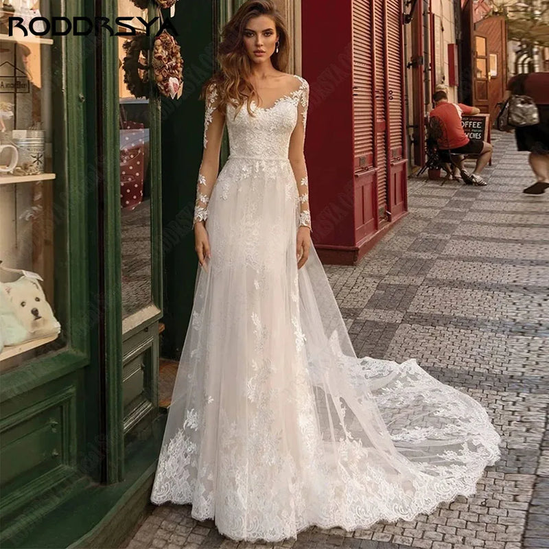 RODDRSYA Long Sleeves Scoop Neck Wedding Dresses Applique Illusion Bride Gowns Light Champagne A-Line Exquisite suknia ślubna