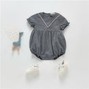 Mamelucos de bebé niña bordados con cuello en V de manga corta de verano 2021