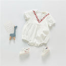 Mamelucos de bebé niña bordados con cuello en V de manga corta de verano 2021