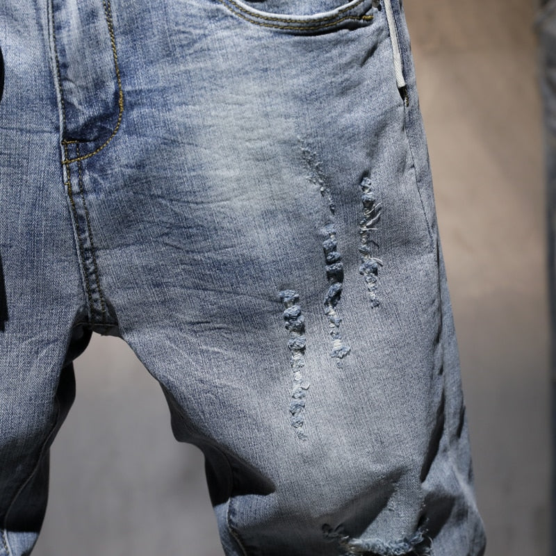 Pantalones vaqueros ajustados informales rasgados para hombre, ropa de calle de marca a la moda para hombre, pantalones vaqueros grises con agujeros desgastados