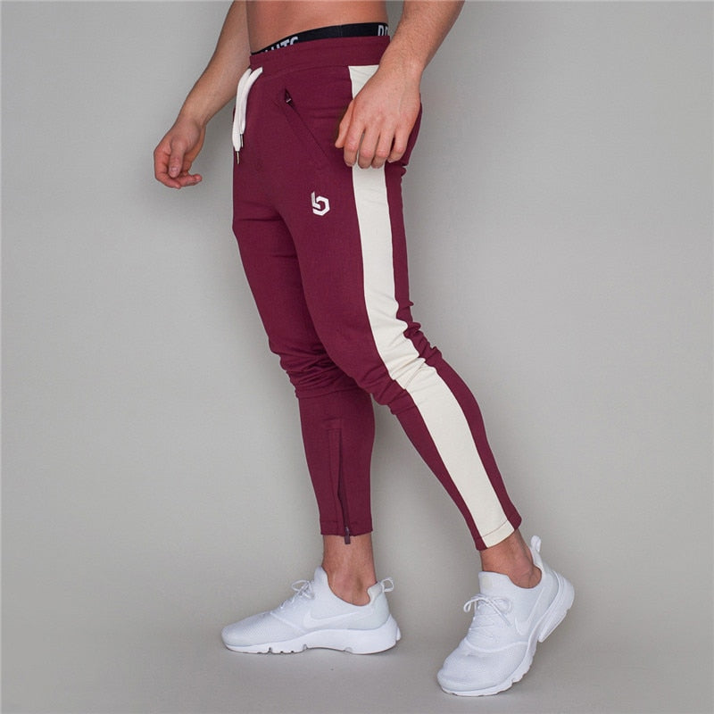 2019 Hombres Joggers Pantalones casuales Fitness Hombres Ropa deportiva Pantalones Pantalones pitillo Pantalones de chándal Pantalones negros Gimnasios Jogger Pantalones de chándal