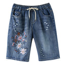 Frauen Sommer Folk Style Elastische Taille Blumenstickerei Kordelzug Zerrissene Shorts Weibliche Bürodame Beiläufige Lose Denim Short