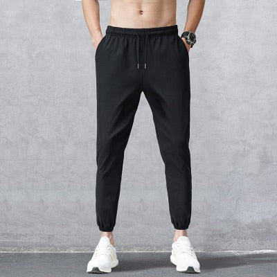 Men&#39;s Sports Pants 2021 Men&#39;s Summer Pants Men&#39;s Tie Feet Trousers Youth Loose Trousers Brand Sweatpants Men Clothing Pants Man