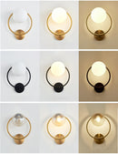 Lámpara de pared Interior Simple posmoderna, luz de dormitorio de cristal, pasillo redondo de lujo, escalera, luces de pared Led nórdicas, accesorio negro dorado