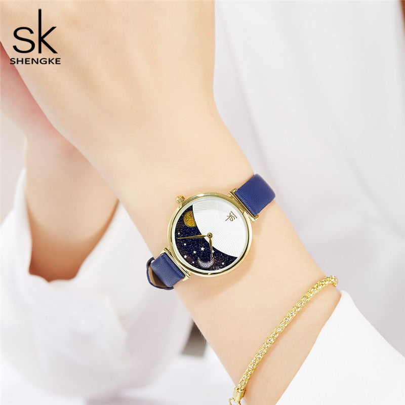 Reloj Shengke de moda azul para mujer, reloj de cuarzo de cuero para mujer, reloj de pulsera informal resistente al agua, esfera romántica con luna y estrellas