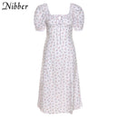 Nibber Y2k Romance francés Retro vestidos de corte bajo Mujeres Estampado floral con cordones Manga abullonada Abertura lateral Midi Vestido Vacaciones Ropa de playa