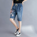 Frauen Sommer Folk Style Elastische Taille Blumenstickerei Kordelzug Zerrissene Shorts Weibliche Bürodame Beiläufige Lose Denim Short
