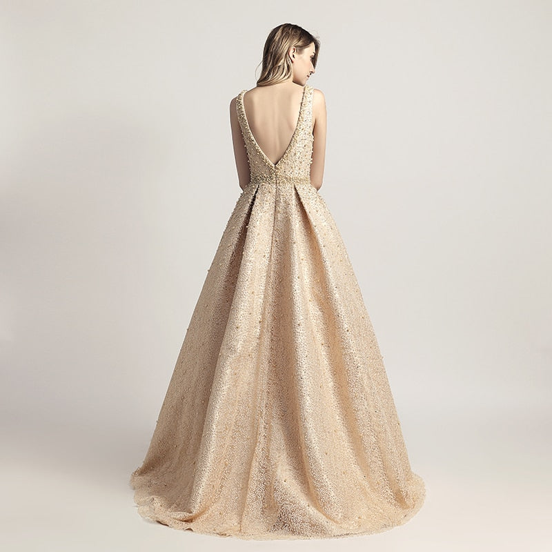 Luxus-Abendkleider lang Dubai Arabisch A-Linie Perle Backless Partykleider bodenlangen ärmellosen formalen Robe de Soiree LX442