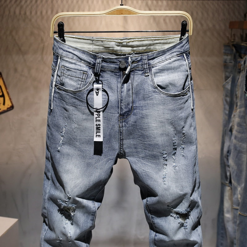 Pantalones vaqueros ajustados informales rasgados para hombre, ropa de calle de marca a la moda para hombre, pantalones vaqueros grises con agujeros desgastados