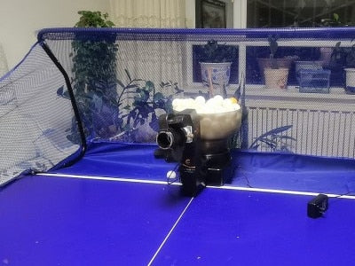 Robot de tenis de mesa Suz, máquina de pelotas de ping pong S102, Control remoto inalámbrico, máquina automática de tenis de mesa para entrenamiento con 40mm