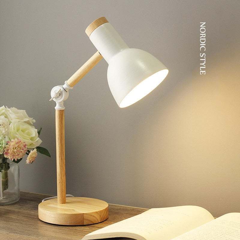 Kreative nordische hölzerne Kunst-Eisen-LED, die einfache Schreibtischlampe-Augenschutz-Lesetischlampe-Wohnzimmer-Schlafzimmer-Ausgangsdekor faltet