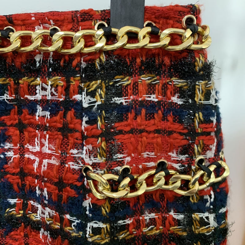 Falda de Tweed a cuadros rojos primavera otoño 2021 nueva cadena borla nuevo diseñador oro León botón lápiz Mini falda de mujer de alta calidad